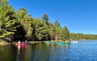 sep2026-camp-18 Canoes out on the lake