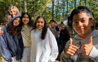 sep2026-camp-20 Students giving thumbs up at camp
