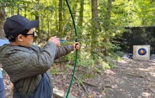 sep2026-camp-24 A student trying archery