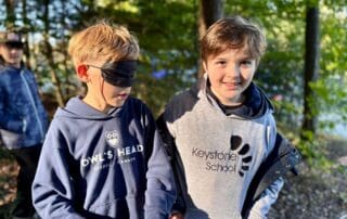 sep2026-camp-25 Students playing a blindfold team game